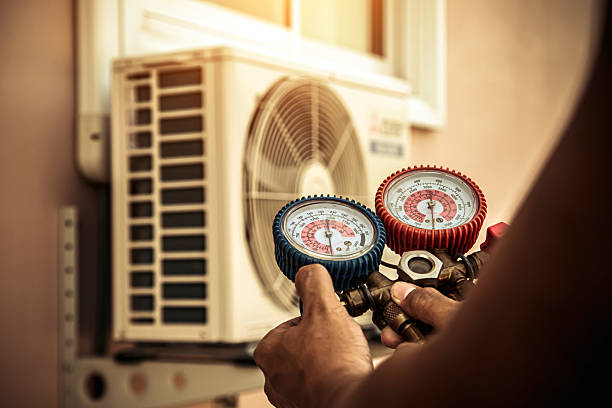 Professional Heat Pump Repair technician working in Rigby, ID